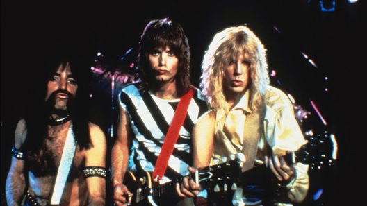 TITLE: THIS IS SPINAL TAP ¥ PERS: SHEARER, HARRY / GUEST, CHRISTOPHER / MCKEAN, MICHAEL ¥ YEAR: 1984 ¥ DIR: REINER, ROB ¥ REF: SPI023BV ¥ CREDIT: [ THE KOBAL COLLECTION / SPINAL TAP PRODUCTION ]