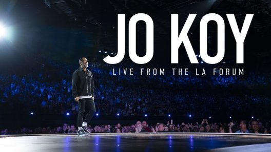 Jo Koy: Live from the Los Angeles Forum. Jo Koy in Jo Koy: Live from the Los Angeles Forum. Cr. Terence Patrick/Netflix © 2022